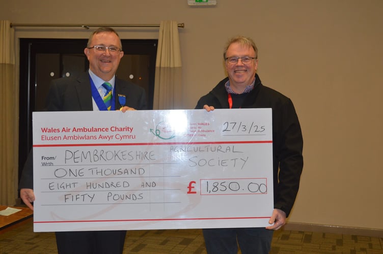 Picture one is of Adam Thorne presenting a cheque of £1,850 to Wales Air Ambulance Charity 's Regional Fundraising Manager, Mike May. It was the second fundraising cheque presentation with £3,250 having been raised in total over Adam’s presidency.