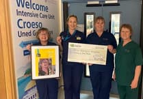 100-meter abseil raises over £3,500 for Intensive Care Unit