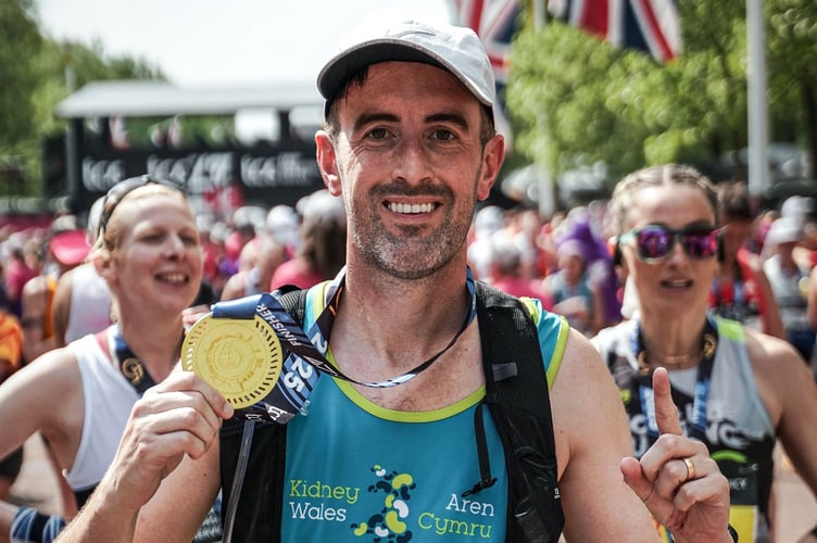 Tenby’s Adam Hughes is now one step away from completing his epic year-long fundraising challenge in celebration of the 10th anniversary of his life-saving kidney transplant, after he completed the London Marathon in what were hot and humid conditions on Sunday, April 27.