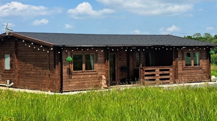 shepherd’s hut and log cabin in Whitland without planning permission have been ordered by a court to pay more than £4,000 between them. 