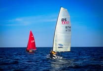 Tenby Sailing Club's Ben Roberts wins dinghy race