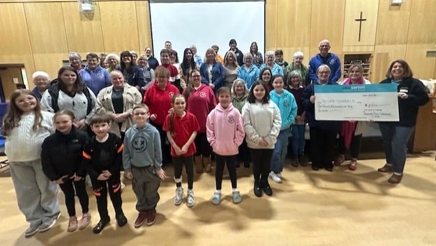 The Pembroke Dock Community Choir's concert raised £1,234 for Paul Sartori Hospice at Home, aiding end-of-life care across Pembrokeshire.