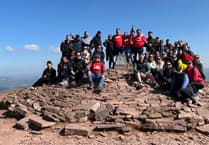 Family raises £12,088 for Wales Air Ambulance and a glass to Katie and Adam's memory
