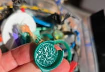 Saundersfoot pupils uncover 1970s Smarties lid during beach clean