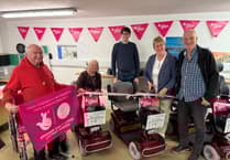 Carmarthenshire's Shopmobility unveils new scooters with lottery funding