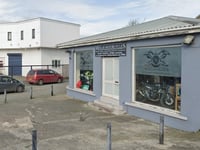 Motorcycle showroom, café plans approved