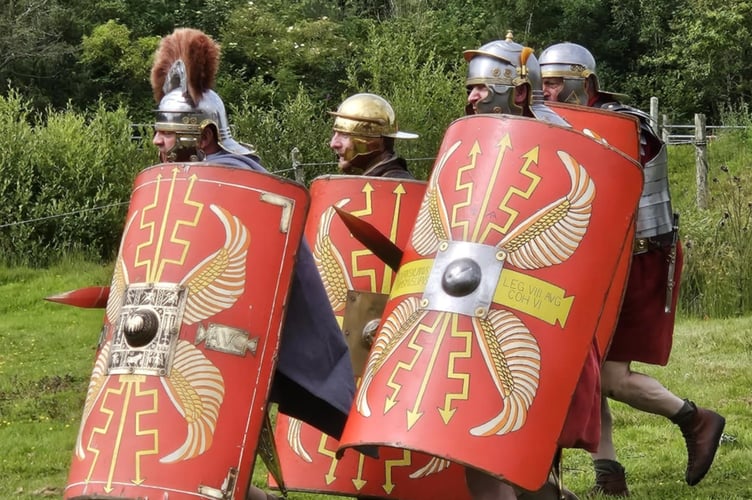 Experience hands-on history at Castell Henllys, from Celtic skills to Roman drills.