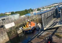 Angle RNLI rescue lone sailor in yacht emergency