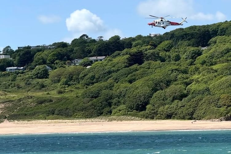 Tenby RNLI lifeboats and a coastguard rescue helicopter were deployed to save paddleboarders in distress due to strong winds over the Bank Holiday weekend.