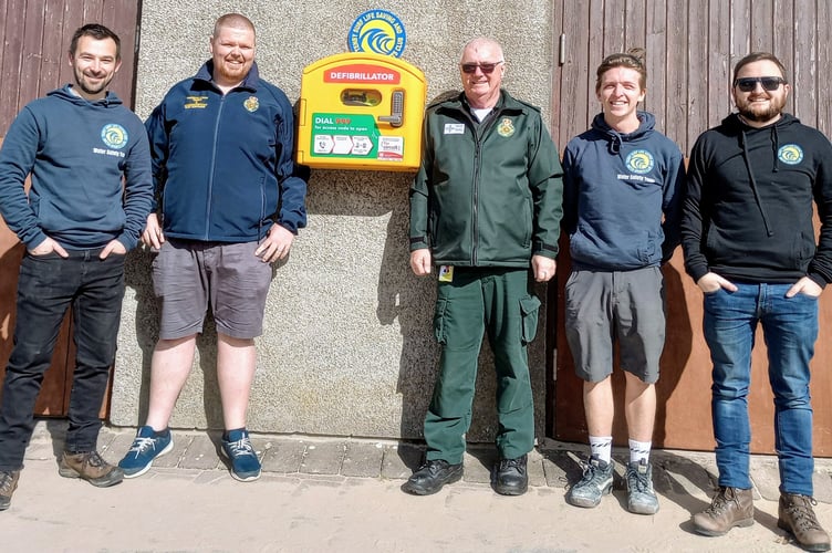 A new public access defibrillator has been installed at Tenby's South Beach, enhancing safety for beach-goers.