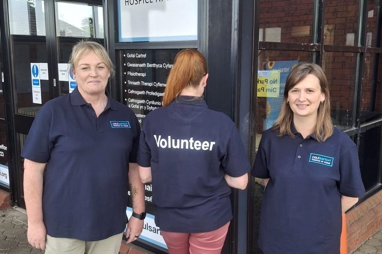 Press pic: from left to right: modelling the volunteer polo shirts - Jo Lutwyche, Event and Fundraising Officer; Lisa Wells, Office Supervisor and Rosie-Faye Hart, Community Relationship Officer from Paul Sartori Hospice at Home