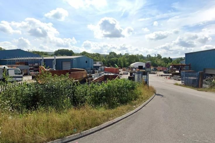 Entrance to the TRJ Ltd yard off Foundry Road, Ammanford, where a new retail park has planning consent