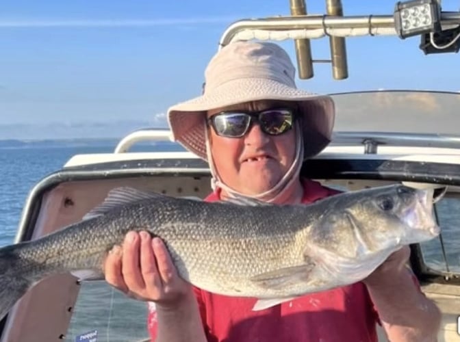 Faddy was a huge character and was never more at home than when down the harbour, or out on his boat catching bass.