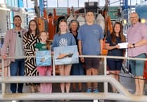 Tenby Mayor and Deputy boost RNLI funds through art project