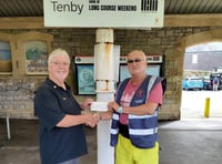 Tenby Station bloom boost from Lions' floral donation