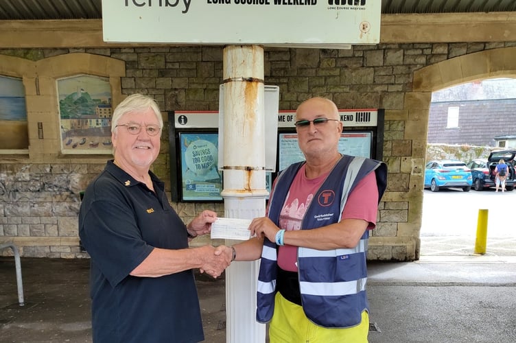 Lions president Roly Fury and secretary Nick Stapleton were on hand this month to present John Perrett (station adopter at Tenby) with the donation towards plants for the platform’s planters. 
