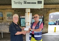 Tenby Station bloom boost from Lions' floral donation