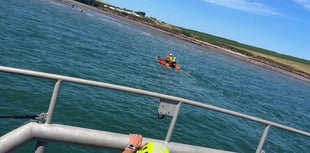 Angle RNLI lifeboat crew rescues stranded paddleboarders