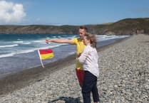 ‘A miracle I survived’: Swimmer reunites with RNLI lifeguard who saved her life