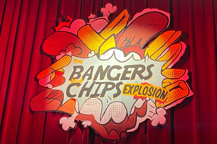 The Bangers and Chips Explosion - logo on Torch Theatre curtains