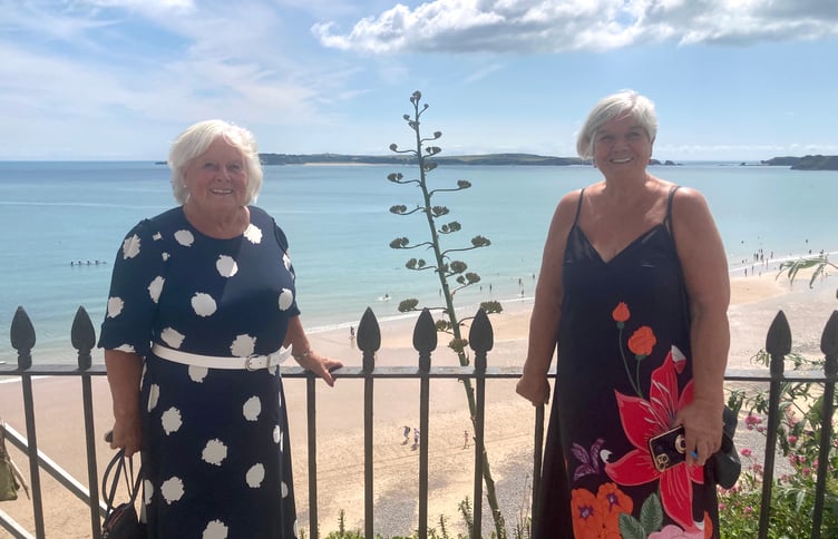 Tenby in Bloom's Tish Rossiter and Sue Lane take a look at the Giltar Hotel's agave plant, which is due to bloom - offering a rare event known as the 'death flower'