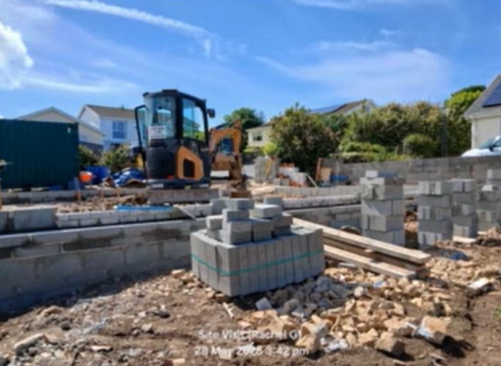 The demolition works at at Bwthyn Llysieueg, 14, Clos Y Bigney, Fishguard. Picture: Pembrokeshire County Council webcast.