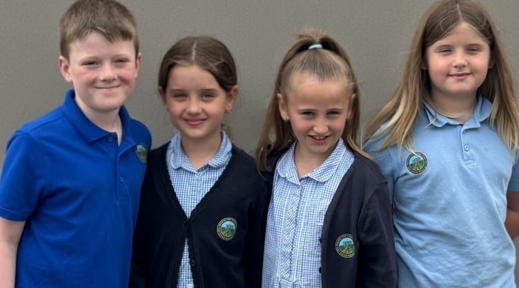 Manorbier Pupils Wearing Iron-On Logos