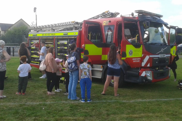Whitland Carnival gave people of all ages a chance to get a closer look at the fire engine.