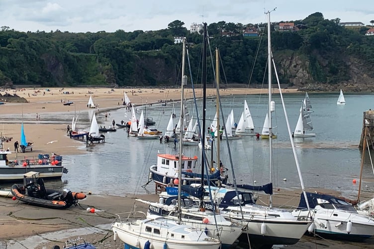 Tired crews coming ashore after three consecutive races at Tenby on August 3