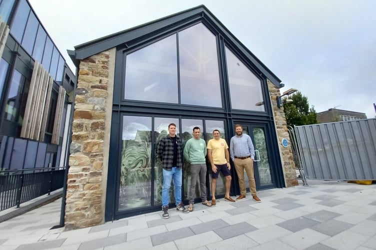  Tenby Brewing Co directors James Beaven, Rob Faulkner and Aaron Smith with Cllr Paul Miller.