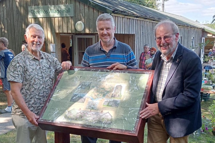 Pictured with the new interpretation panel at The Rhos are, left to right: artist Graham Brace, Steve Jones and John Evans. 