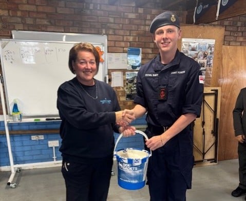 Andrea - a warden from Meadow Farm camp site presented Tenby Sea Cadets with the donation this month.