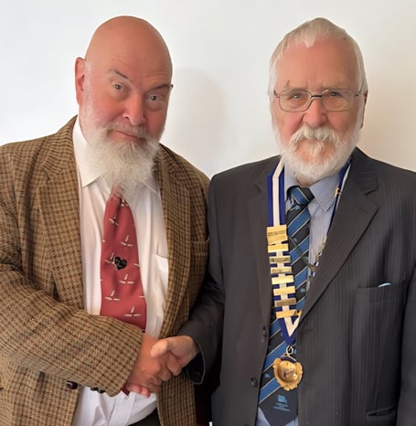 Beekeeper Paul Eades (left) with Narberth Probus President Patrick Jones at the club’s August 2025 meeting.