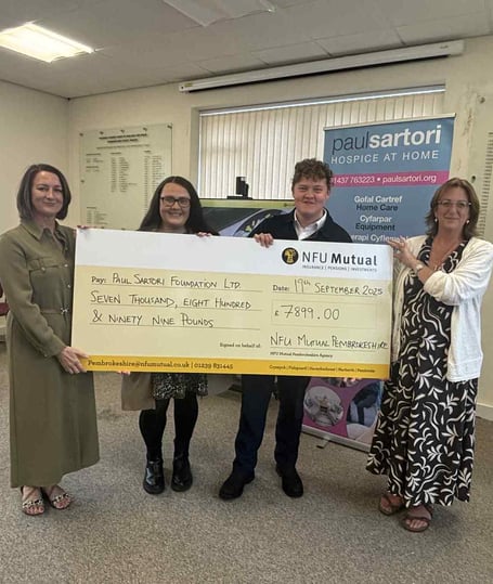 Cara Norman, Lauren Harries and Joshua Scrivens from NFU Mutual along with Sandra Dade, Charity Manager of Paul Sartori Foundation