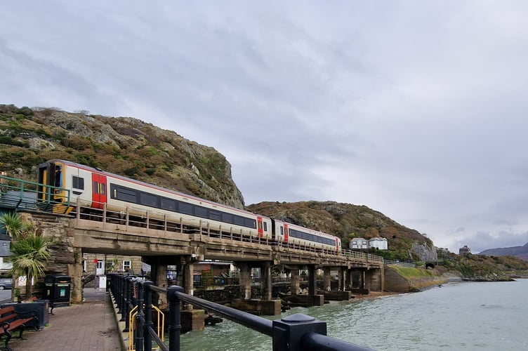 A train entering Barmouth Station on the Cambrian Coast Line.