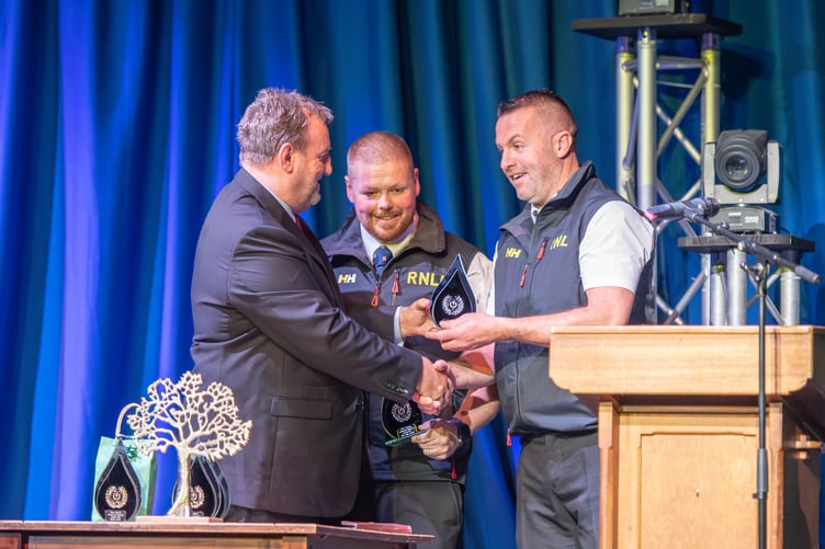 Rob James and Chris ‘Yobbler’ Thomas receiving their Blue Light Awards from Cllr Laurence Blackhall