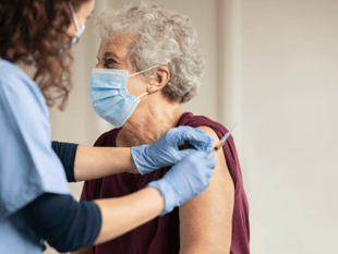 Urgent vaccination call as flu hits Wales early