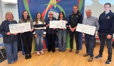 Pictured above: Members of C.Ff.I Sir Gâr - Carmarthenshire YFC with Claire Rumble, Fundraising Officer.