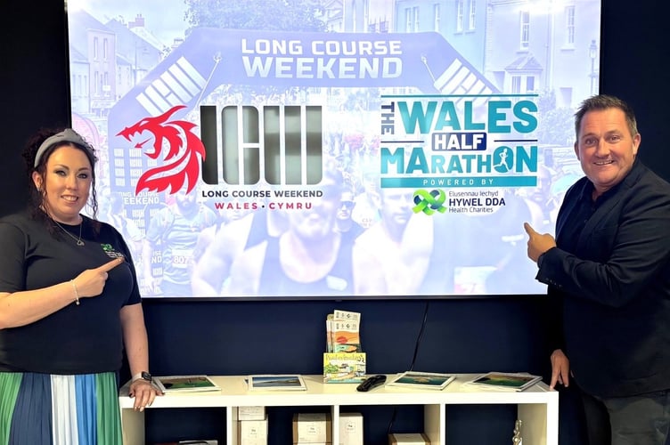 Hywel Dda Health Charities Fundraising Manager Tara Nickerson with Matthew Evans, CEO of Long Course Weekend 