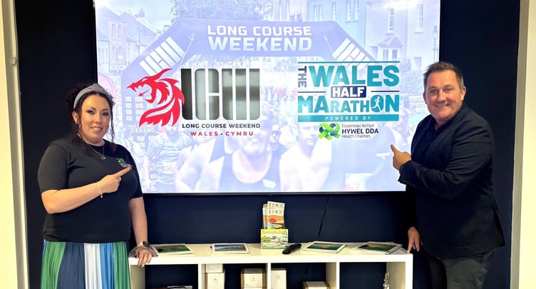 Hywel Dda Health Charities Fundraising Manager Tara Nickerson with Matthew Evans, CEO of Long Course Weekend