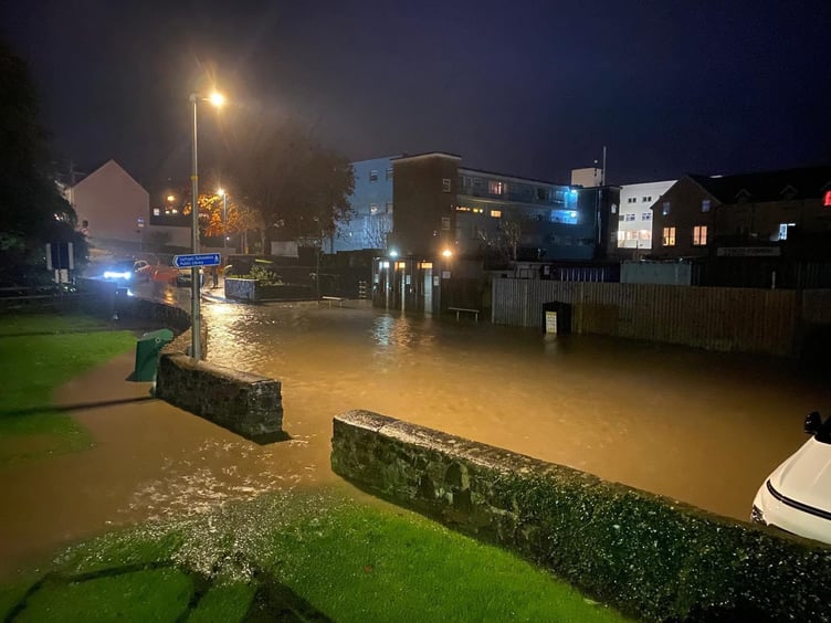 An image of the car park by Saundersfoot's Regency Hall flooded on Tuesday night shared by Saundersfoot Youth Club on social media.