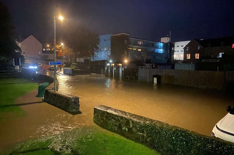 An image of the car park by Saundersfoot's Regency Hall flooded on Tuesday night shared by Saundersfoot Youth Club on social media.
