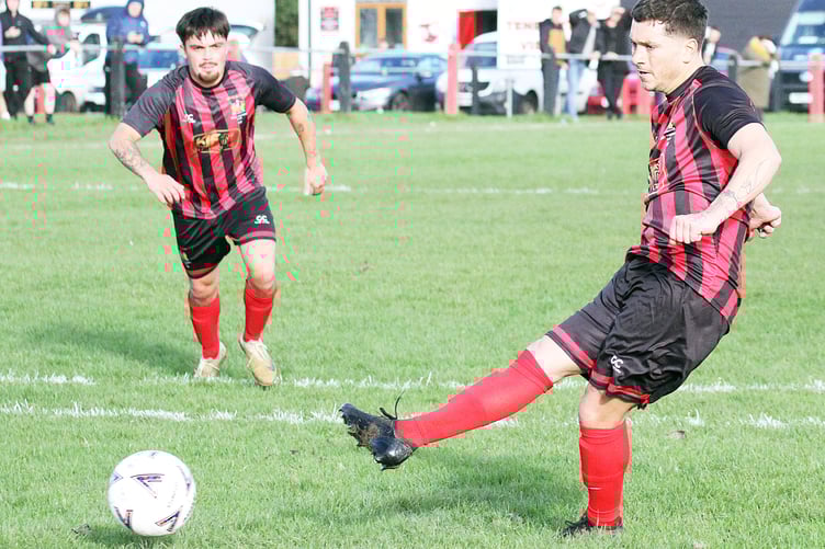 Tenby open the scoring with a penalty from Scott Ferney