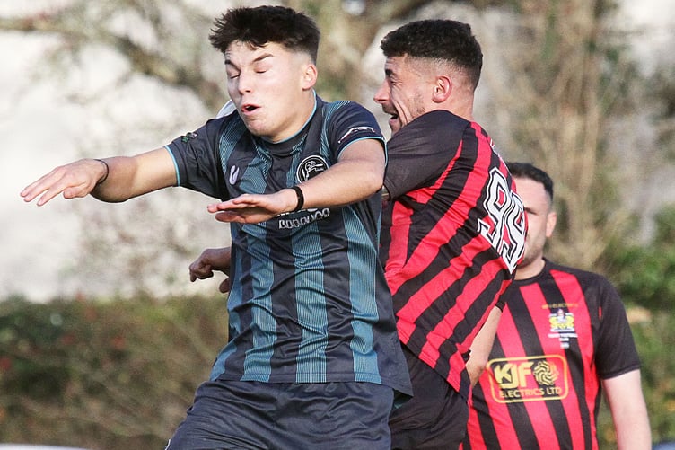 An aerial challenge during Tenby's defeat against St Ishmaels