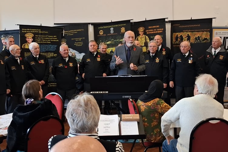Choir accompanist Rev’d William Lambert and choristers at the VC Gallery