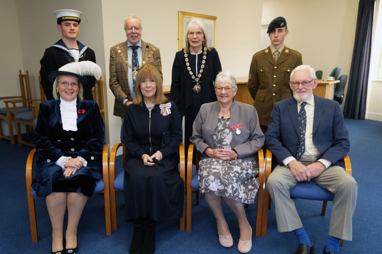 Mrs Butler receives the British Empire Medal for services to people with disabilities, to young people and to charity. 