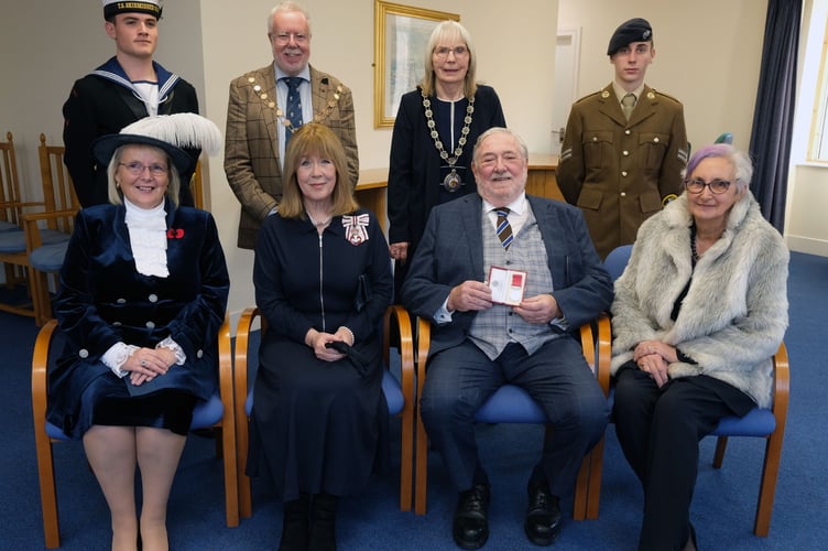 Dr O’Connor, Director of Angling Cymru, receives the British Empire Medal for services to recreational angling in Wales. 