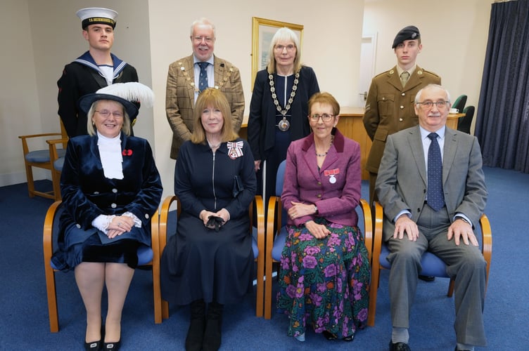 Mrs Mountstephens receives the British Empire Medal for services to service personnel and the community in Brawdy. 