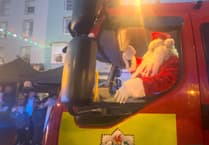 WATCH: Santa makes an early appearance for Tenby's festive switch-on!