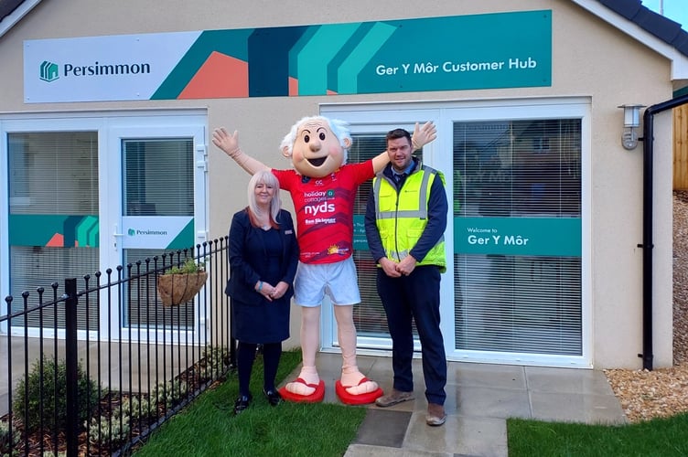 Saundersfoot NYDS mascot, Charlie Shivers, with members from the Ger-y-Môr site and sales team.